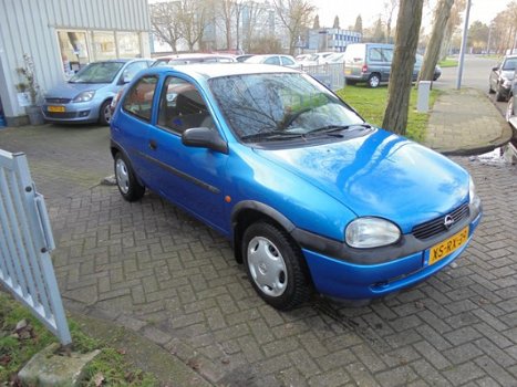 Opel Corsa - 1.2i-16V Strada - 1