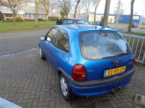 Opel Corsa - 1.2i-16V Strada - 1