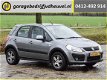 Suzuki SX4 - 1.6 Comfort / airconditioning / cruise control / trekhaak / lichtmetalen velgen - 1 - Thumbnail