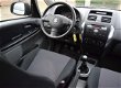 Suzuki SX4 - 1.6 Comfort / airconditioning / cruise control / trekhaak / lichtmetalen velgen - 1 - Thumbnail