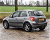 Suzuki SX4 - 1.6 Comfort / airconditioning / cruise control / trekhaak / lichtmetalen velgen - 1 - Thumbnail