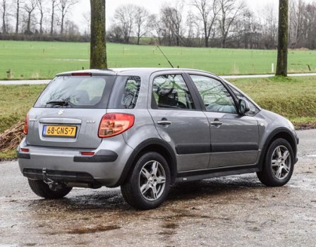 Suzuki SX4 - 1.6 Comfort / airconditioning / cruise control / trekhaak / lichtmetalen velgen - 1