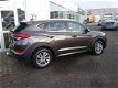 Hyundai Tucson - 1.6 Comfort | Navigatie | Trekhaak | Stoelverwarming | Camera - 1 - Thumbnail