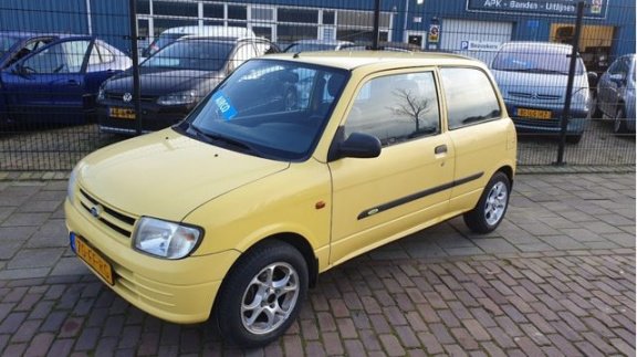 Daihatsu Cuore - 1.0-12V XTi - 1