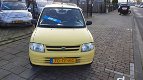 Daihatsu Cuore - 1.0-12V XTi - 1 - Thumbnail