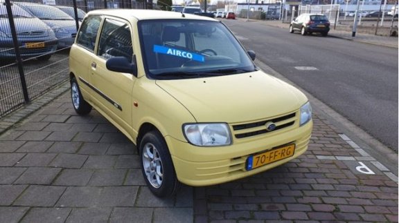 Daihatsu Cuore - 1.0-12V XTi - 1