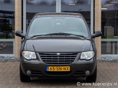 Chrysler Voyager - 2.4i 16V SE-Luxe 7-persoons / 2 Schuifdeuren - 1