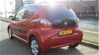 Toyota Aygo - 1.0 VVT-i Dynamic Orange LUX UITVOERING_DEALER ONDERHOUD - 1 - Thumbnail