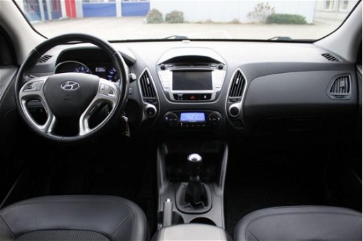 Hyundai ix35 - 2.0i 4WD Business Edition - 1