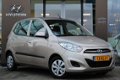 Hyundai i10 - 1.1 i-Drive Cool | Airco | Lage km-stand - 1 - Thumbnail