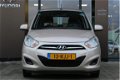 Hyundai i10 - 1.1 i-Drive Cool | Airco | Lage km-stand - 1 - Thumbnail