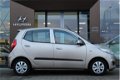 Hyundai i10 - 1.1 i-Drive Cool | Airco | Lage km-stand - 1 - Thumbnail