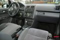 Volkswagen Touran - 1.4 TSI Highline DSG-7 Navi / PDC / LMV / Bluetooth / Cruise - 1 - Thumbnail