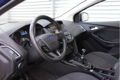 Ford Focus Wagon - 125 pk Titanium | Trekhaak | Navi | Clima | Voorruitverw. | - 1 - Thumbnail