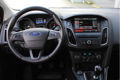 Ford Focus Wagon - 125 pk Titanium | Trekhaak | Navi | Clima | Voorruitverw. | - 1 - Thumbnail