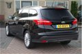 Ford Focus Wagon - 1.5 TDCI Titanium Lease Edition 100% onderhouden - 1 - Thumbnail