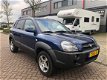 Hyundai Tucson - 2.0i Dynamic APK AIRCO DEALER ONDERHOUDEN - 1 - Thumbnail