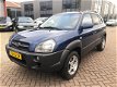 Hyundai Tucson - 2.0i Dynamic APK AIRCO DEALER ONDERHOUDEN - 1 - Thumbnail