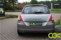 Suzuki Swift - 1.2 Navi, Led, Airco, Cruise, Camera - 1 - Thumbnail