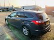 Ford Focus Wagon - 1.0 EcoBoost Titanium navigatie cruise control airco ecc pdc trekhaak - 1 - Thumbnail