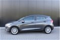Ford Fiesta - 1.0 100pk Ecob. 5-drs Titanium / navigatie / bluetooth / parkeersensoren - 1 - Thumbnail