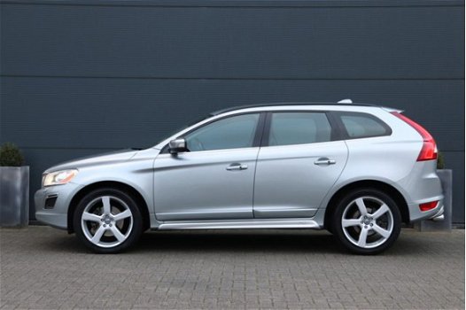 Volvo XC60 - 2.4 D5 AWD R-Design Navigatie| Xenon| Keyless| Trekhaak| PDC| Bluetooth| Leder| Stoelve - 1