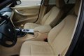 BMW 3-serie Touring - 318d High Executive 19 inch, nieuwstaat nap - 1 - Thumbnail