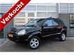 Hyundai Tucson - 2.0i Style Supreme Leder Navigatie 1ste eigenaar N.A.P - 1 - Thumbnail