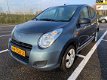 Suzuki Alto - 1.0 Comfort Plus APK 09-01-2021 1e eigenaar Bak giert - 1 - Thumbnail