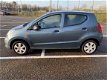 Suzuki Alto - 1.0 Comfort Plus APK 09-01-2021 1e eigenaar Bak giert - 1 - Thumbnail