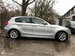 BMW 1-serie - 118d High Executive ex bpm exportprijs - 1 - Thumbnail