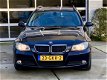 BMW 3-serie Touring - 318i Business Line Leer, Navi, Cruise, Bovag garantie - 1 - Thumbnail