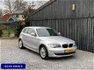 BMW 1-serie - 116i Business Line | Autom. Airco | Cruise Control | Sportstoelen | APK tot 23-06-2020 - 1 - Thumbnail