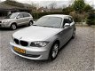 BMW 1-serie - 116i Business Line | Autom. Airco | Cruise Control | Sportstoelen | APK tot 23-06-2020 - 1 - Thumbnail
