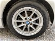 BMW 1-serie - 116i Business Line | Autom. Airco | Cruise Control | Sportstoelen | APK tot 23-06-2020 - 1 - Thumbnail