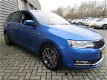 Skoda Rapid Spaceback - Uniek 5000 km 1.0 TSI 95PK AUTOMAAT/NAVI/TREKHAAK/CLIMA/DRIVE - 1 - Thumbnail