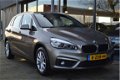 BMW 2-serie Active Tourer - 218i High Executive | Leer | Stoelverwarming | Groot navi | Clima | Head - 1 - Thumbnail