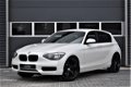 BMW 1-serie - 118d / 5-DEURS / NAVI / CLIMA / SPORTSTOELEN / PARELMOER - 1 - Thumbnail