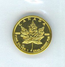 1 Gram puur.999 fijn Zilver/goud muntje,Canadian maple leaf!