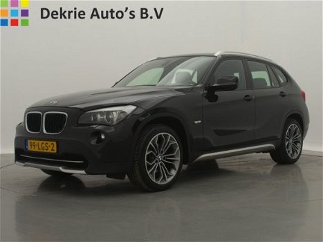 BMW X1 - sDrive18i Executive AUTOMAAT / NAVI / AIRCO-ECC / LEDER / PANORAMADAK / PDC / LMV / TREKHA - 1