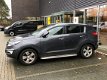 Kia Sportage - 1.6 GDI ISG X-clusive (LEER/Glazen dak/Xenon/NAV./Climate/1ste eig.) - 1 - Thumbnail