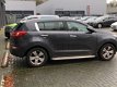 Kia Sportage - 1.6 GDI ISG X-clusive (LEER/Glazen dak/Xenon/NAV./Climate/1ste eig.) - 1 - Thumbnail