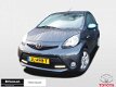 Toyota Aygo - 1.0 VVT-i Dynamic Blue (Automaat - Airconditioning) - 1 - Thumbnail