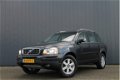 Volvo XC90 - 2.4 D5 Summum AUTOMAAT / NAVI / LEDER - 1 - Thumbnail