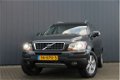 Volvo XC90 - 2.4 D5 Summum AUTOMAAT / NAVI / LEDER - 1 - Thumbnail