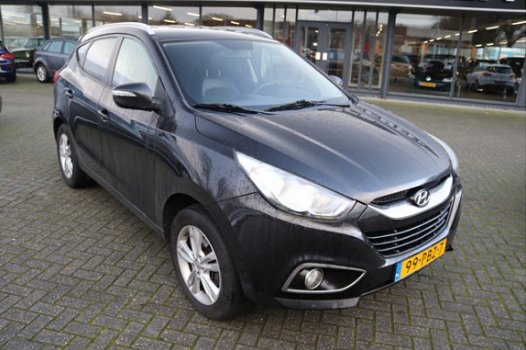 Hyundai ix35 - 2.0i Business Edition 50 procent deal 3.725, - ACTIE Half leer / Navi / Bluetooth / C - 1