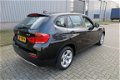 BMW X1 - sDrive20i Business Automaat /Navi/Clima/17inch/2e Eig/NAP/Garantie - 1 - Thumbnail