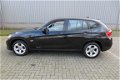 BMW X1 - sDrive20i Business Automaat /Navi/Clima/17inch/2e Eig/NAP/Garantie - 1 - Thumbnail