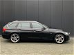 BMW 3-serie Touring - 320i Sport Line 2e eig. Xenon Leder Navi E.klep - 1 - Thumbnail