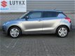 Suzuki Swift - 1.2 Select Smart Hybrid | Airco | Achteruitrijcamera | L.M. Velgen - 1 - Thumbnail